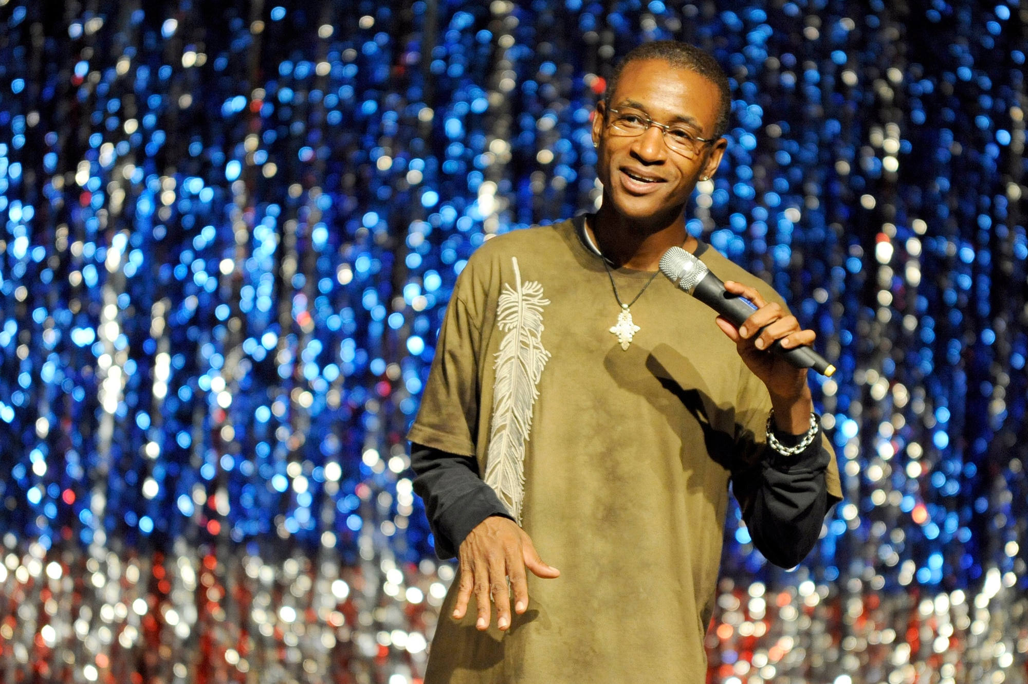 MISAWA AIR BASE, Japan -- Actor and comedian Tommy Davidson entertains the crowd with impressions and jokes at the Misawa Club May 7. Davidson is famous for his role on the Fox Television show In Living Color. (U.S. Air Force photo/Staff Sgt. Marie Brown/Released)