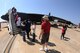 Attendees of the 2011 Defenders of Liberty Air Show stand in line to get a close up view of a B-52H Statofortress on Barksdale Air Force Base, La., May 7. The B-52 has conventional and nuclear capabilities and can travel at speeds up to 650 miles per hour. (U.S. Air Force photo/Airman 1st Class Micaiah Anthony)(RELEASED)