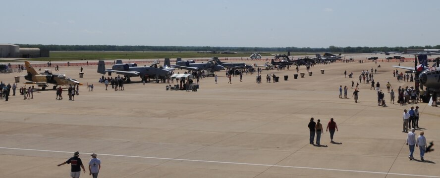 Spectators of the 2011 Defenders of Liberty Air Show look at static displays on Barksdale Air Force Base, La., May 7. Aircraft and parachute demonstrations, static displays and re-enactments were a few events held at this year's air show. (U.S. Air Force photo/Airman 1st Class Micaiah Anthony)(RELEASED)