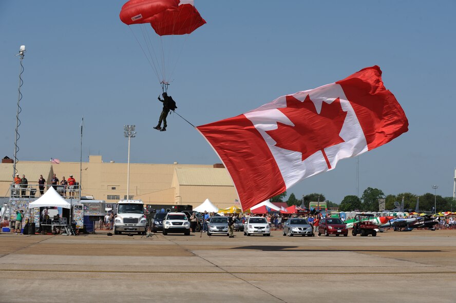 A member of the Canadian Forces Parachute Demo Team, the SkyHawks, prepares to land in front of the crowd during the 2011 Defenders of Liberty Air Show on Barksdale Air Force Base, La., May 7. The SkyHawks team has conducted more than 5,000 jumps and several training hours in preperation for their 2011 season. (U.S. Air Force photo/Airman 1st Class Micaiah Anthony)(RELEASED)