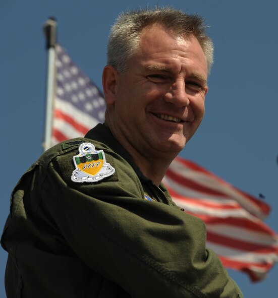 Col. Tim Fay, 2nd Bomb Wing commander, smiles for the camera during the 2011 Defenders of Liberty Air Show on Barksdale Air Force Base, La., May 7. Aircraft and parachute demonstrations, static displays and re-enactments were a few events held at this year's air show. (U.S. Air Force photo/Airman 1st Class Micaiah Anthony)(RELEASED)