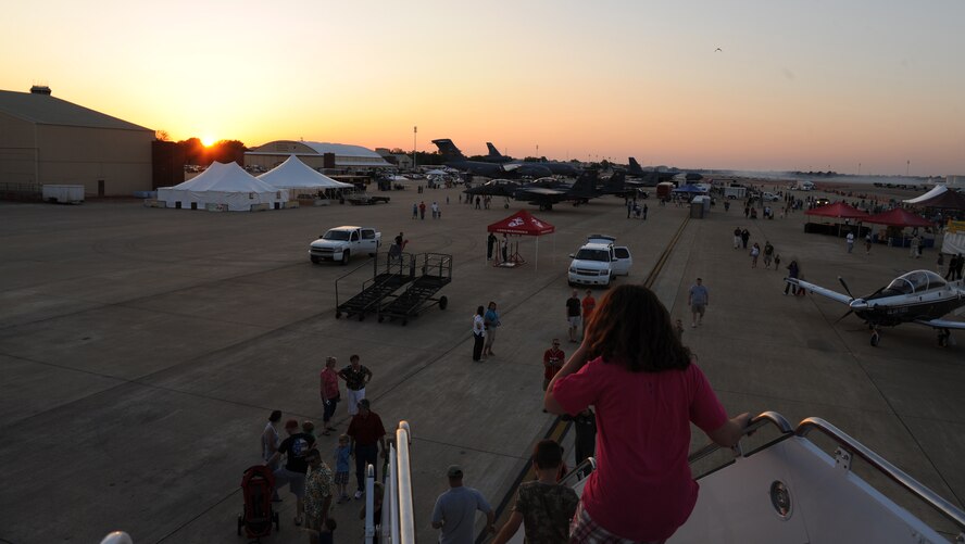 Patrons of the Twilight Show explore static displays on Barksdale Air Force Base, La., May 6. The Twilight Show was a special demonstration for military members and their families to enjoy prior to the Defenders of Liberty Air Show, which was open to the public May 7 and 8. (U.S. Air Force photo/Airman 1st Class Micaiah Anthony) (RELEASED)