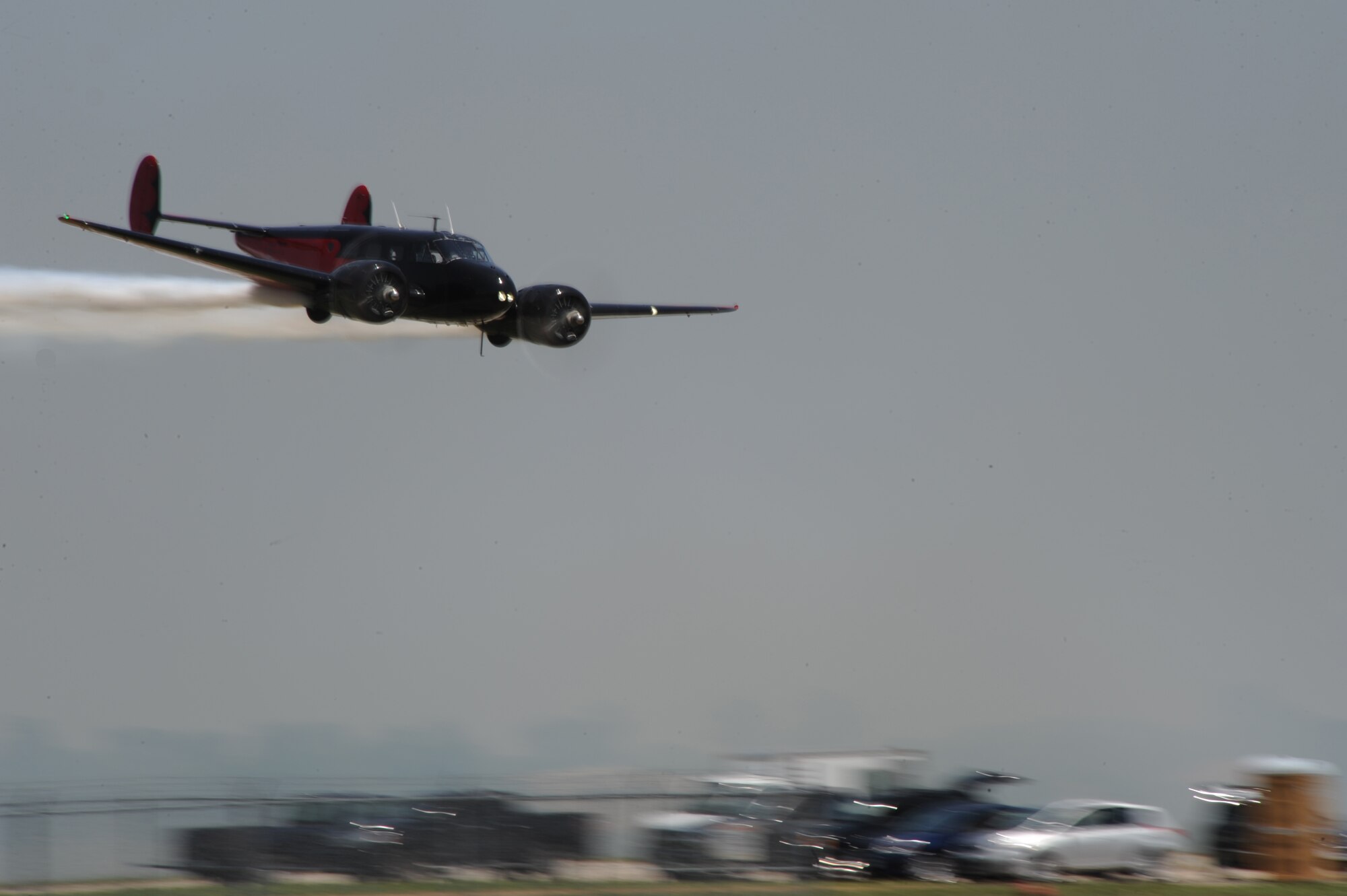 Pilot Matt Younkin flies low for the crowd in a Twin Beech 18 during the 2011 Defenders of Liberty Air Show on Barksdale Air Force Base, La., May 7. Aircraft and parachute demonstrations, static displays and re-enactments were a few events held at this year's air show. (U.S. Air Force photo/Airman 1st Class Micaiah Anthony)(RELEASED)