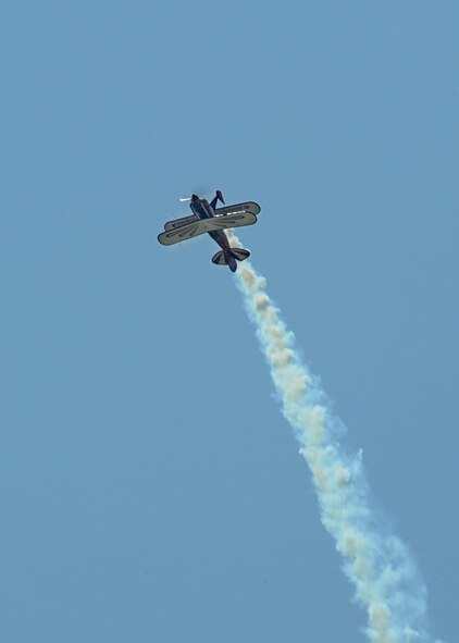 Pilot Jacquie B. flies the "Red Eagle" Pitts biplane during the 2011 Defenders of Liberty Air Show at Barksdale Air Force Base, La., May 7. The aircraft is acknowledged as the worlds leading competing aerobatic and air show display biplane. (U.S. Air Force photo/ Senior Airman Kristin High)(RELEASED)