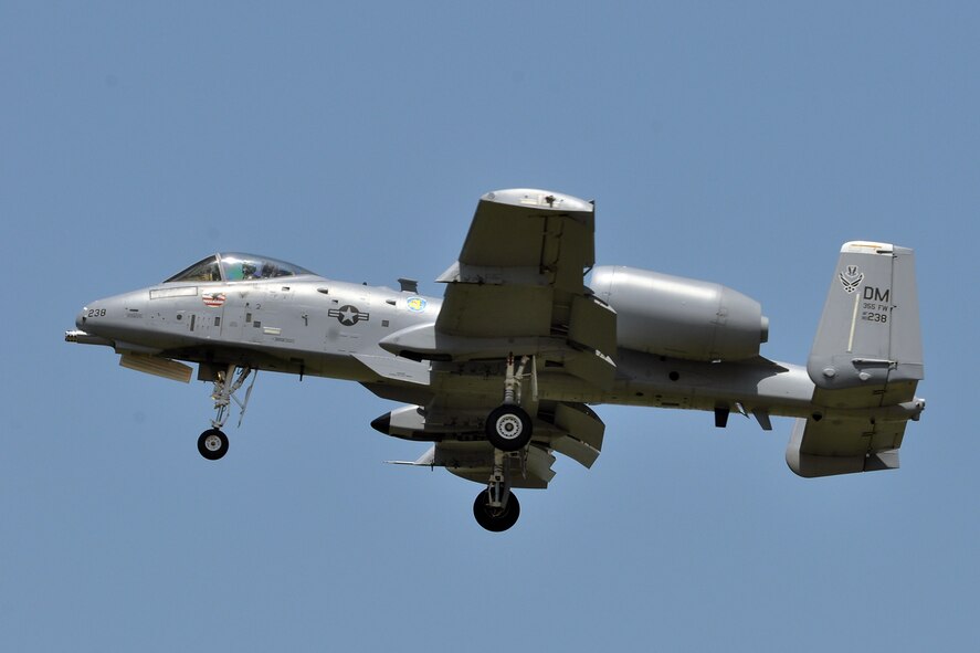 An A-10 “Warthog” Thunderbolt from Davis Monthan Air Force Base, Ariz., flies past crowds of air show spectators during the 2011 Defenders of Liberty Air Show at Barksdale Air Force Base, La., May 7. The A-10 Demonstration Team demonstrated the abilities of the aircraft as well as how it performs in combat situations. (U.S. Air Force photo/Tech. Sgt. Jeffery Walston)