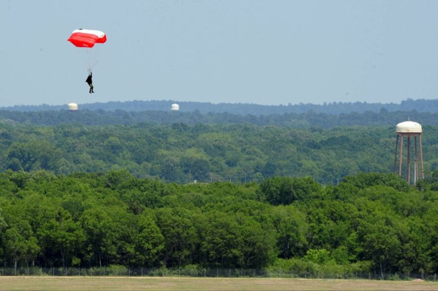 A member of the Canadian Forces Parachute Demo Team, The SkyHawks, floats to the ground during the first day of the Defenders of Liberty Air Show at Barksdale Air Force Base, La., May 7. The 2011 air show line up included Pearl Harbor recreationists Tora Tora Tora and the A10 Demo Team. (U.S. Air Force photo/Senior Airman Joanna M. Kresge)
