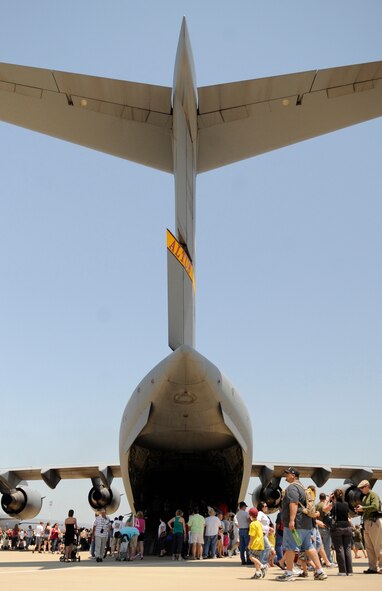 Spectators enjoy a walk through of C-17 from Altus Air Force Base, Okla., during the Defenders of Liberty Air Show at Barksdale AFB, La., May 7. There were more than 60 aircraft static displays for the air show and many allowed tours for spectators. (U.S. Air Force photo/Staff Sgt. John Gordinier) (Released)