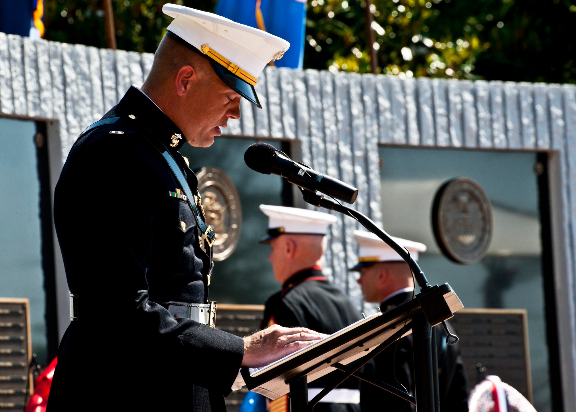 Chief Warrant Officer Ahonen reads the names of the fallen Marine Corps explosive ordnance disposal technicians during a memorial ceremony May 7 at Eglin Air Force Base, Fla.  Fifteen new names were added to the memorial wall this year.  The total, which includes all services, now stands at 269.  The Marine Corps added eight names to the wall – Staff Sgt.s Adam Perkins, Joshua Cullins, Jordan Emrick, Gunnery Sgt.s Christopher Eastman, Floyd Holley, Justin Schmalstieg, Master Sgt. Daniel Fedder and Sgt. Jason Smith. (U.S. Air Force photo/Samuel King Jr.)