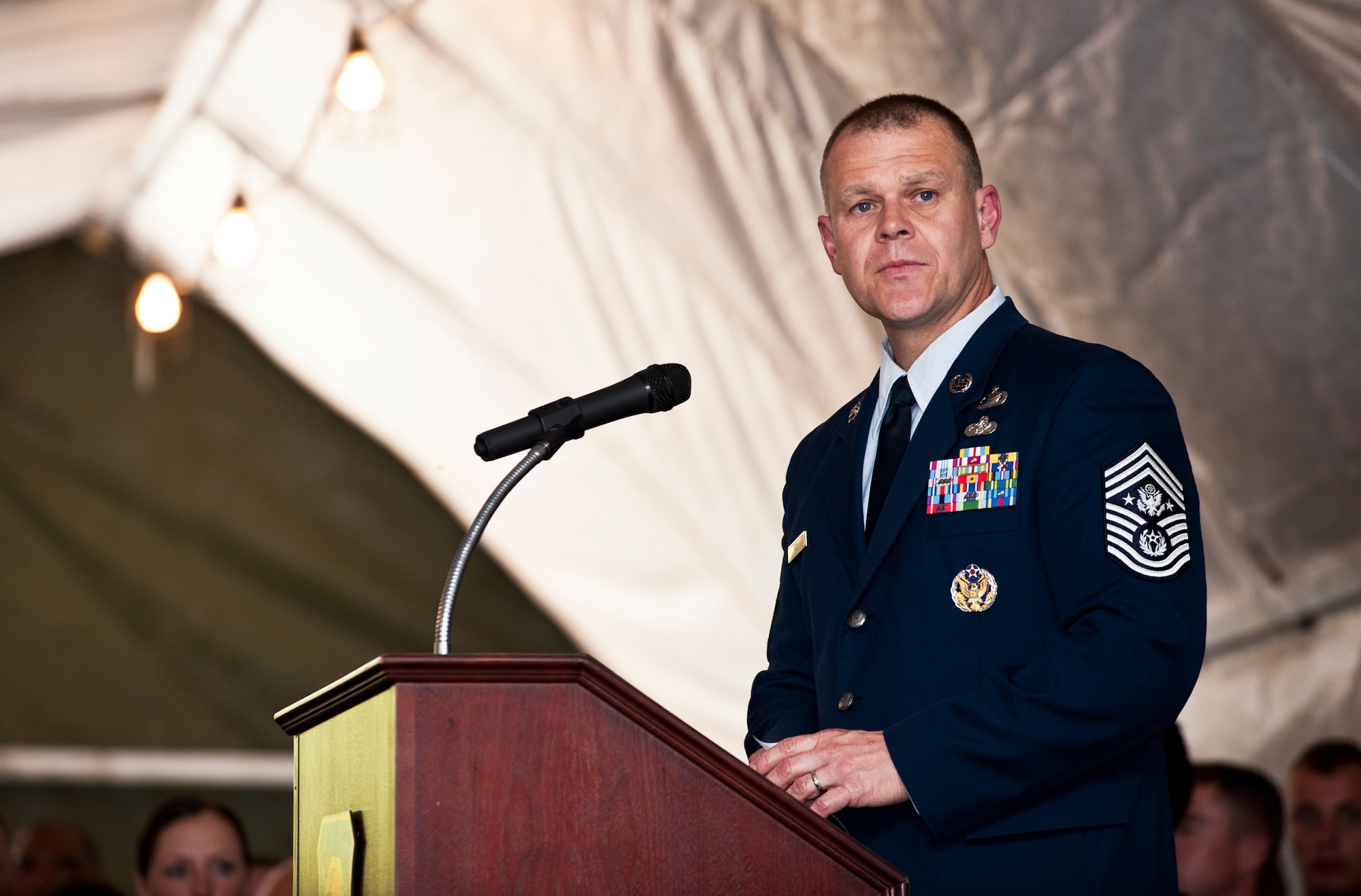 Chief Master Sgt. of the Air Force James Roy addresses Air Force explosive ordnance disposal technicians and their families May 7, 2011, at Eglin Air Force Base, Fla.  Chief Roy addressed the group immediately after the annual EOD memorial ceremony, during which two new names of EOD Airmen were added to the wall.  (U.S. Air Force photo/Samuel King Jr.)
