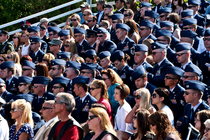 Rows of explosive ordnance disposal Airmen fill the stands at this year’s EOD Memorial ceremony May 7 at Eglin Air Force Base, Fla.  Fifteen new names were added to the memorial wall this year.  The total, which includes all services, now stands at 269.  The Air Force added two names to its wall - Senior Airmen Michael Buras and Daniel Johnson.   (U.S. Air Force photo/Samuel King Jr.)