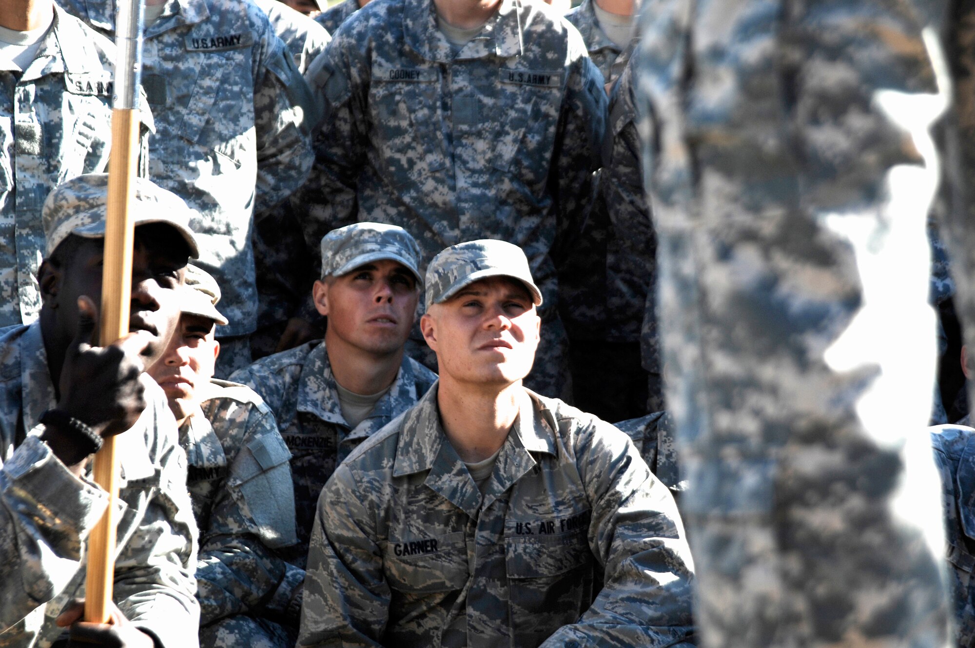 Airman 1st Class Matthew Garner listens to a speech from a Ranger Training Brigade leader April 29, 2011, at Ft. Benning, Ga. The Ranger graduation ceremony was preceded by a Rangers in Action Demonstration and attended by hundreds of friends and families. Airman Garner is assigned to the 823rd Base Defense Squadron. (U.S. Air Force photo/Airman 1st Class Brigitte N. Brantley-Sisk)

