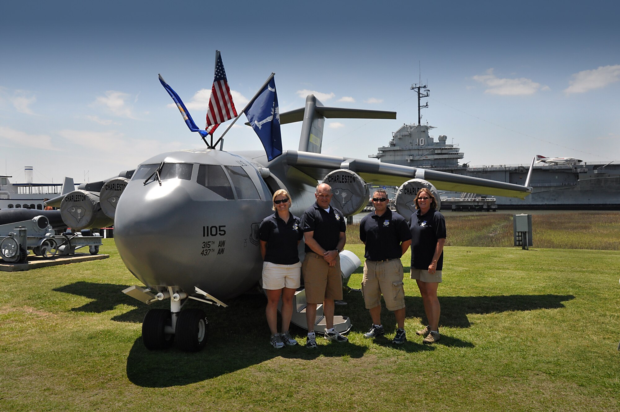 The 315th Airlift Wing’s mini-C-17, which was set up in the parking lot next to a fire truck and the mobile Vet Center was by far the most popular attraction for the kids of all ages at the Charleston VA Welcome Home event May 5, 2011.  Mini C-17 team members for the event included Master Sgt. Beth Holzbaur, 315th Aircraft Maintenance Squadron, Master Sgt. Cindy Learn, 315th Security Forces Squadron, Tech. Sgt. Chris Fabel, 315th AMXS, and Staff Sgt. Mark Graveline 315th AMXS. (U.S. Air Force Photo by 1st Lt. Joe Simms)