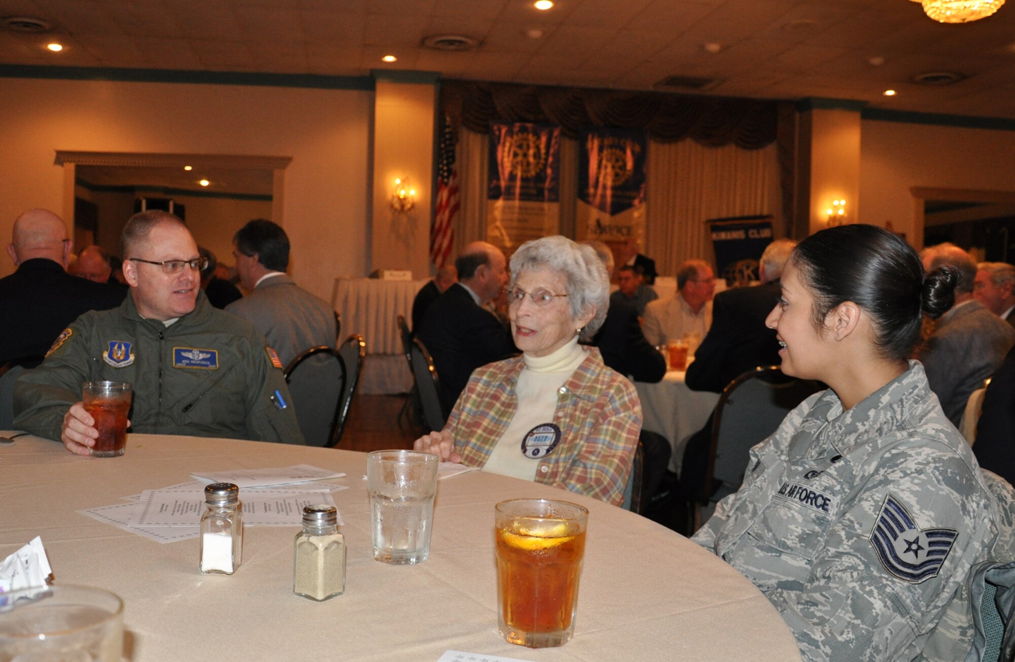WRIGHT-PATTERSON AIR FORCE BASE, Ohio – Senior Master Sgt. Michael Kalbfleisch, 89th Airlift Squadron and Tech. Sgt. Linda Reed, 445th Force Support Squadron, enjoy a conversation with Springfield Kiwanis Club member Ms. Ruth Folz during the 30th Annual Armed Forces Day luncheon May 3. More than 235 people attended the luncheon sponsored by the Springfield Rotary Club, Springfield Kiwanis Club, Springfield Exchange Club and the Miami Valley Military Affairs Association, is held annually to recognize and honor area military units, installations and assigned personnel who serve the Springfield-Clark County community, the State of Ohio and the United States. (U.S. Air Force photo/Lt. Col. Cynthia Harris)