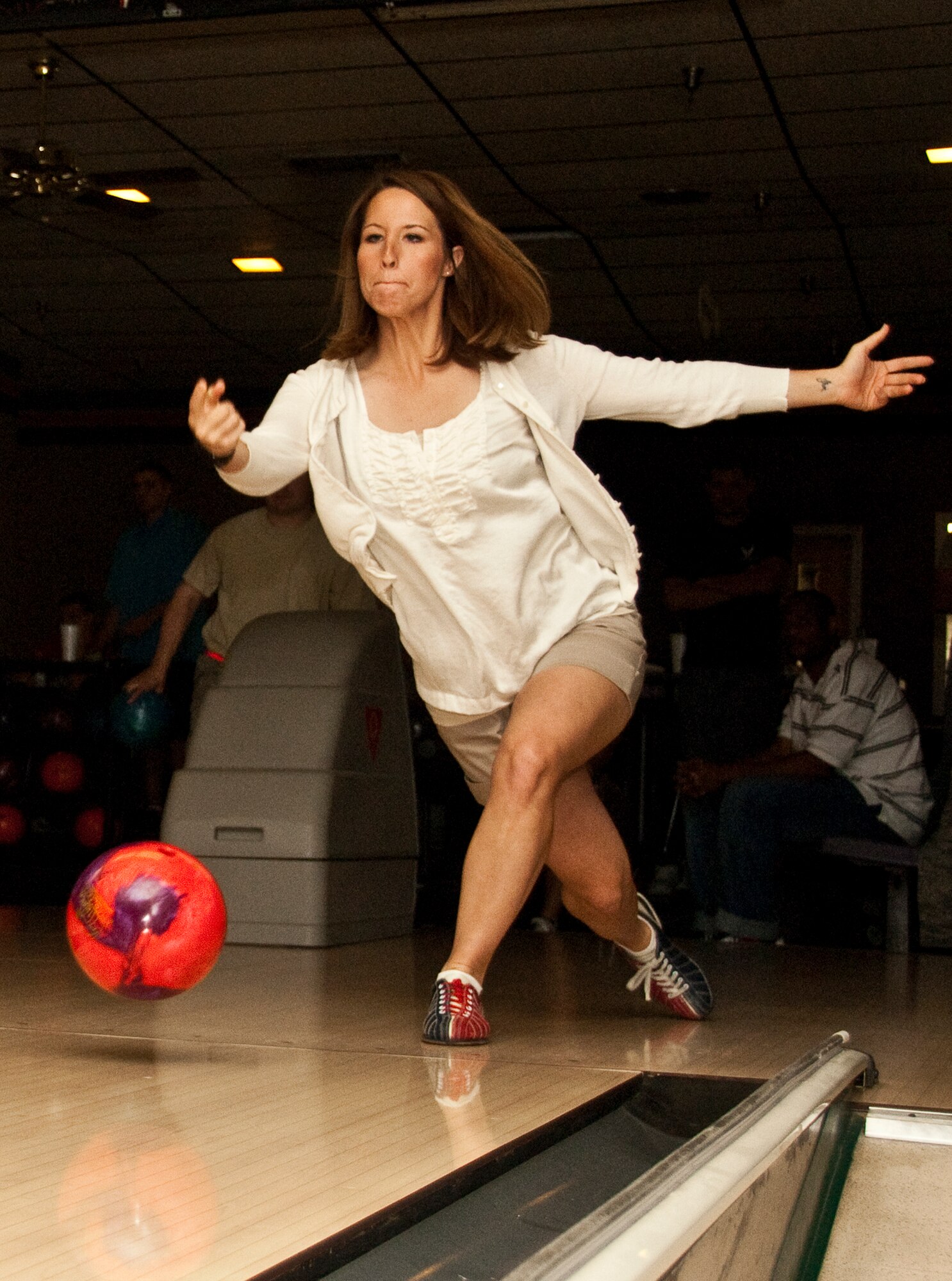 Staff Sgt. Jessica Arango, 46th Air Maintenance Squadron, shows off her bowling skills at the Air Force Assistance Fund Bowling Rally fundraiser held May 6 at the Eglin Bowling Alley. More than 100 bowlers came out and helped the 46th AMXS raise over $500. All money raised will benefit the 2011 AFAF. (U.S. Air Force Photo/Sachel Seabrook)                     