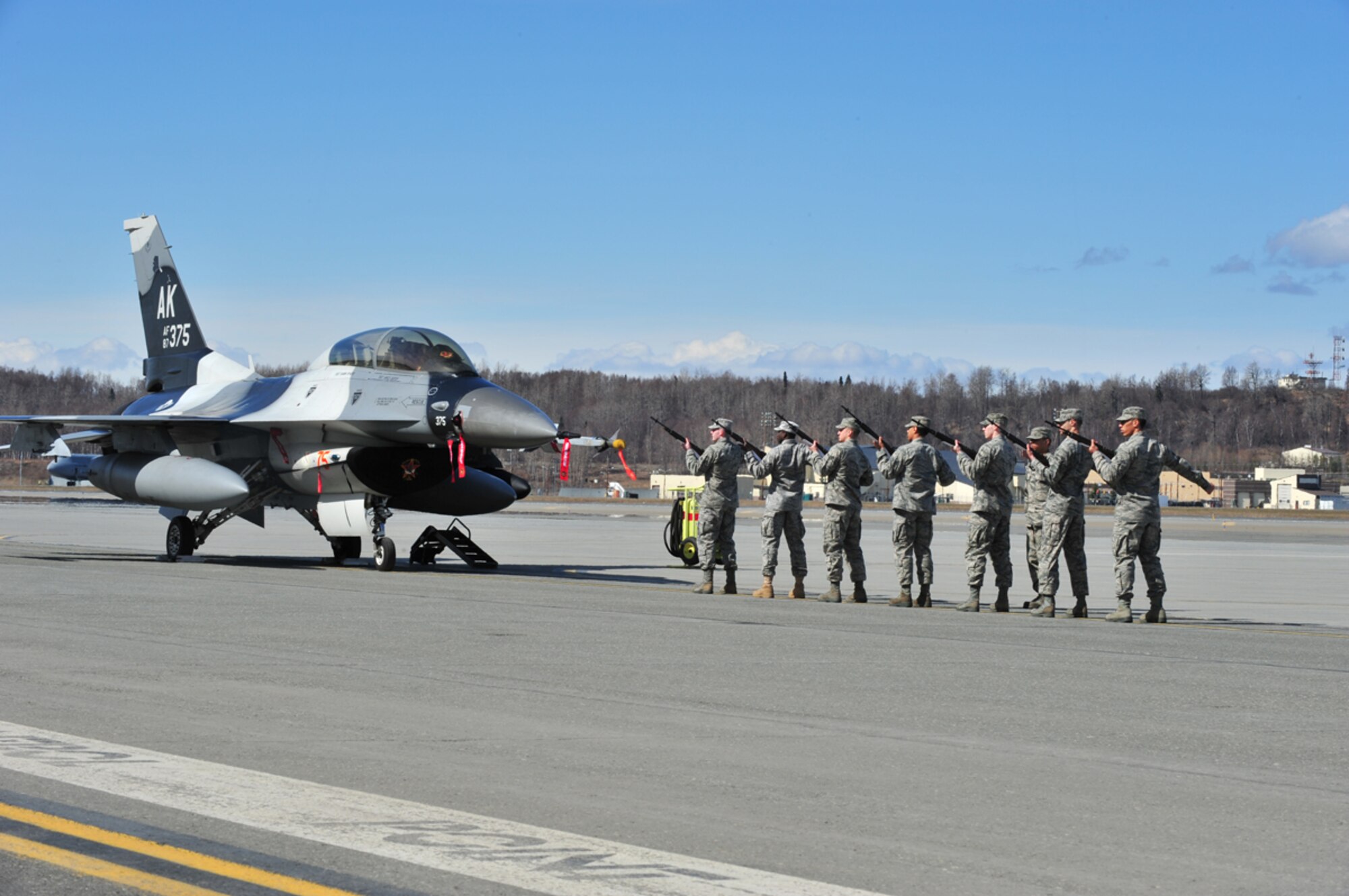 JOINT BASE ELMENDORF-RICHARDSON, Alaska -- Members of the 673d Air Base Wing Honor Guard, perform a 21 gun salute to honor Major David "Klepto" Brodeur, 11th Air Force, here May 2. Brodeur was one of nine casualties of an attack by an Afghan air force officer. (U.S. Air Force Photo/Staff Sgt. Joshua Garcia)
