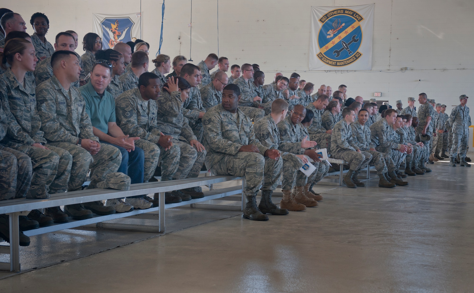 MOODY AIR FORCE BASE, Ga. -- Moody members take their seats during a change of command ceremony May 7. Distinguished guests from Moody and the local area attended the ceremony to show their respect for the outgoing commander and support for the incoming commander. (U.S. Air Force photo/Airman 1st Class Douglas Ellis)(RELEASED)
