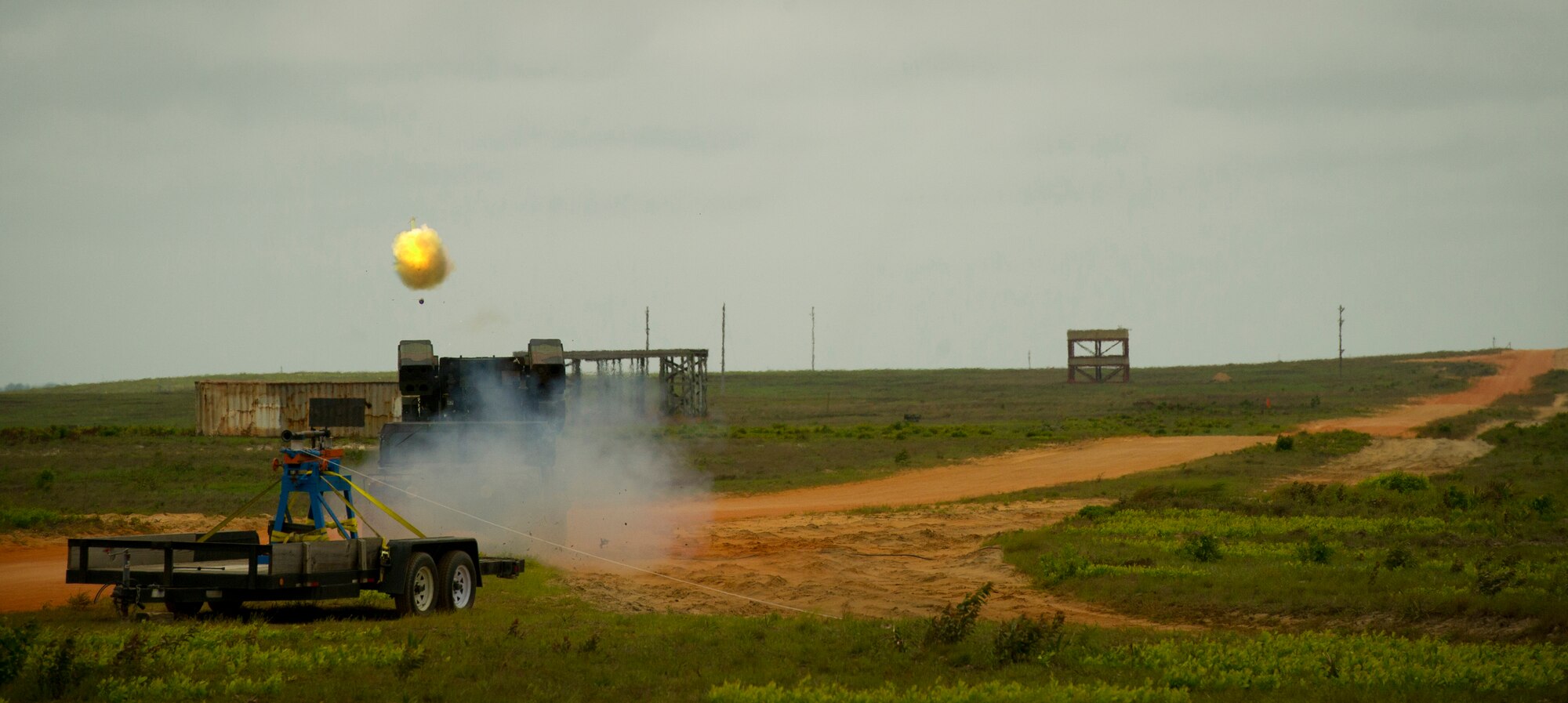 A stinger missile takes flight from a HUMVEE April 26, 2011 at a range on Eglin Air Force Base, Florida.  The stinger was launched during a demonstration showcasing the damage it can do. The target was a UH1 Huey helicopter.(U.S. Air Force photo by Senior Airman David Salanitri/Released)