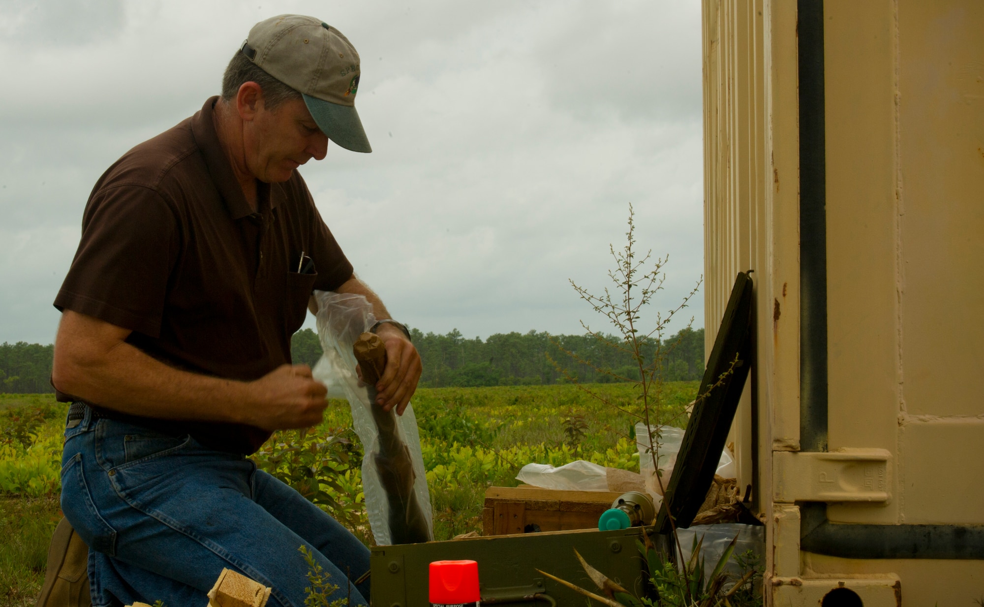 Chief Master Sgt. (ret.) William Walter assembles a Rocket Propelled Grenade launcher April 26, 2011 at a range on Eglin Air Force Base, Florida.  Mr. Walter, Air Force Special Operations Command A5 strike requirements office, helps conduct a demonstration of what damage an RPG can do to a helicopter annually.  Mr. Walter's target was an UH1 Huey helicopter. (U.S. Air Force photo by Senior Airman David Salanitri/Released)