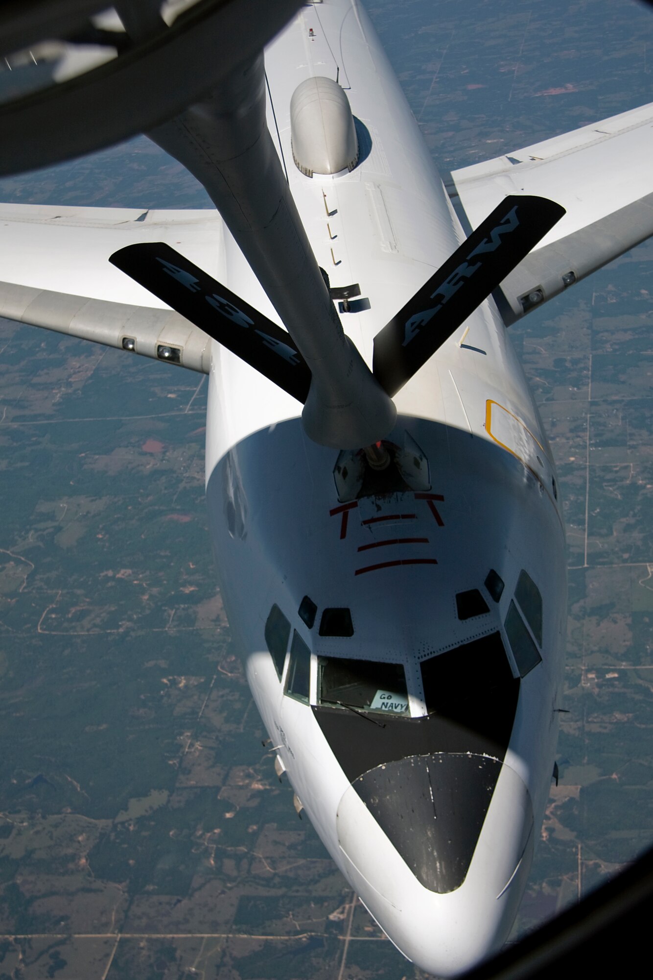 GRISSOM AIR RESERVE BASE, Ind. -- A U.S. Navy E-6B Mercury refuels from a 434th Air Refueling Wing KC-135R Stratotanker during a refueling mission May 5. The E-6, which used the call sign Shadow 20, is a ccommunications relay and strategic airborne command post aircraft. Two squadrons, the "Ironmen" of VQ-3 and the "Shadows" of VQ-4 deploy more than 20 aircrews from Tinker Air Force Base, Okla. Onboard the KC-135 were Indiana media representatives who got a firsthand look at the aerial refueling mission of the 434th ARW. (U.S. Air Force photo/Tech. Sgt. Mark R. W. Orders-Woempner)
