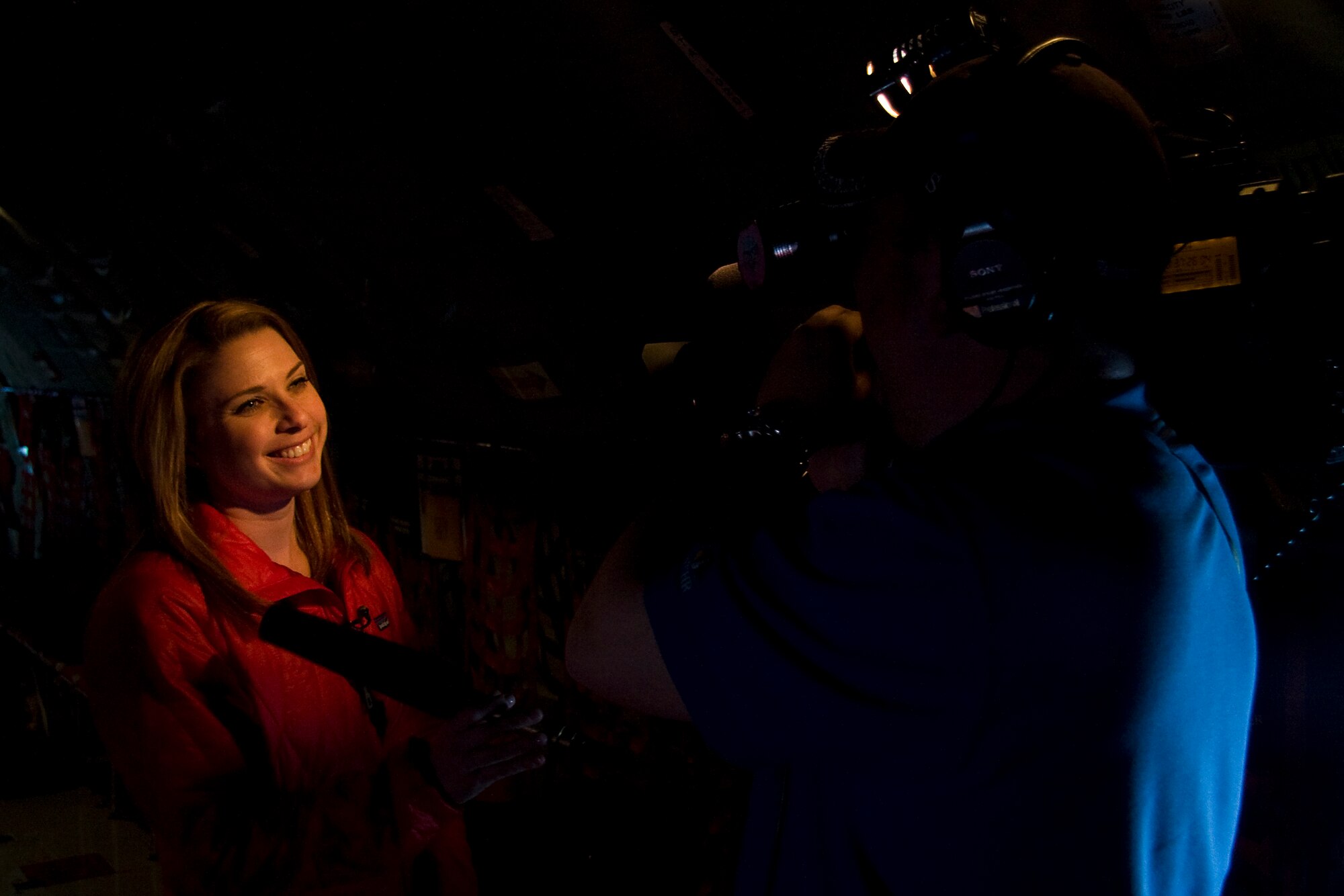 GRISSOM AIR RESERVE BASE, Ind. -- Nicole Misencik, a meteorologist and reporter with WTHR in Indianapolis, films a report with her photojournalist partner Scott Allen onboard a Grissom KC-135R Stratotanker during a media orientation flight May 5. During the flight 13 new and traditional media representatives were able to witness firsthand the mission of the 434th Air Refueling Wing. (U.S. Air Force photo/Tech. Sgt. Mark R. W. Orders-Woempner)
