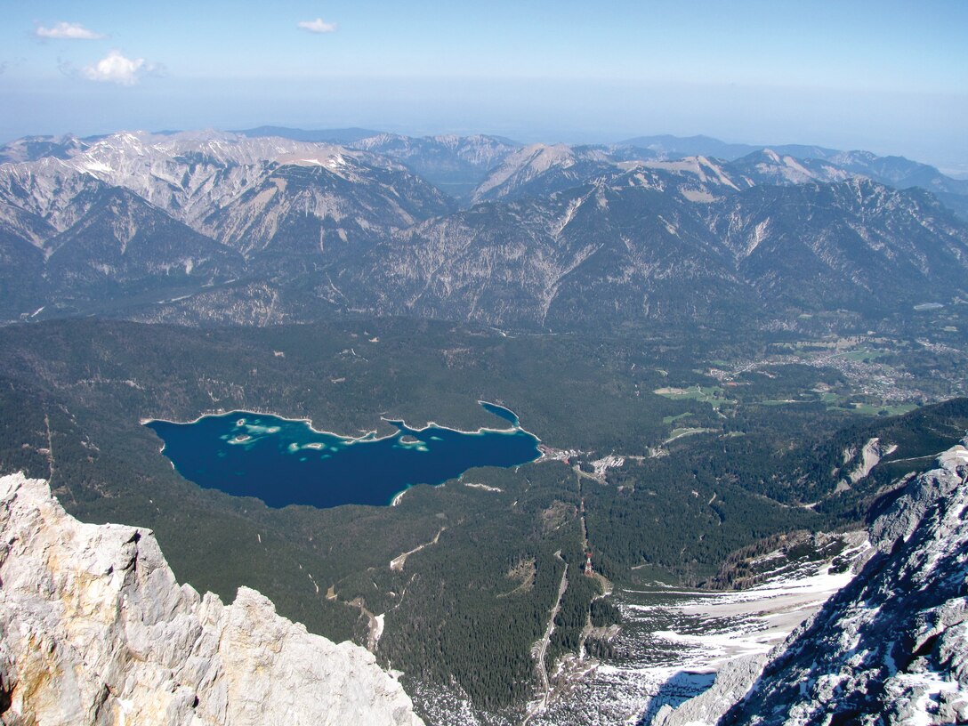 The view from the Zugspitze summit in Germany. You can reach the Zugspitze summit by a combination of train and cable car or by taking one cable car ride to the top.  (U.S. Air Force photo/Tech. Sgt. Ryan Kruse)