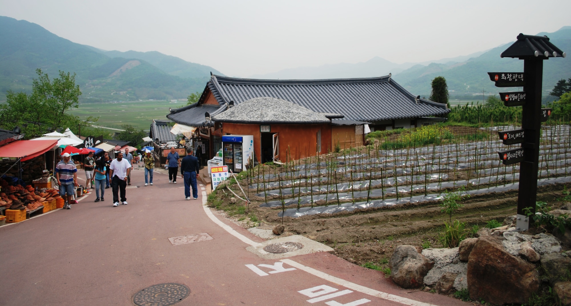 HADONG-GUN, Republic of Korea -- A steep hill populated with local merchants, artisans and traditional Korean scenery enrich the experience for those enjoying their time at the 16th Hadong Wild Tea Culture Festival here May 8. Kunsan Airmen traveled to the county of Hadong-gun where they learned how to make tea, relished in local cuisine and hiked a mountain to a Korean heritage center. (U.S. Air Force photo/2nd Lt. Spencer Wile)