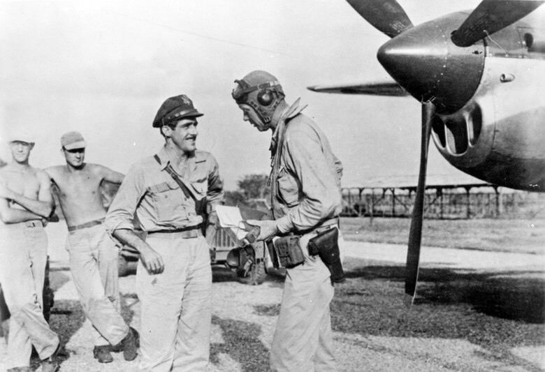 Famed aviator Charles A. Lindbergh with Maj. Thomas B. McGuire (left). During the summer of 1944, Lindbergh visited the Southwest Pacific Theatre and devised economical flight techniques to extend the range of P-38 fighters. (U.S. Air Force photo)