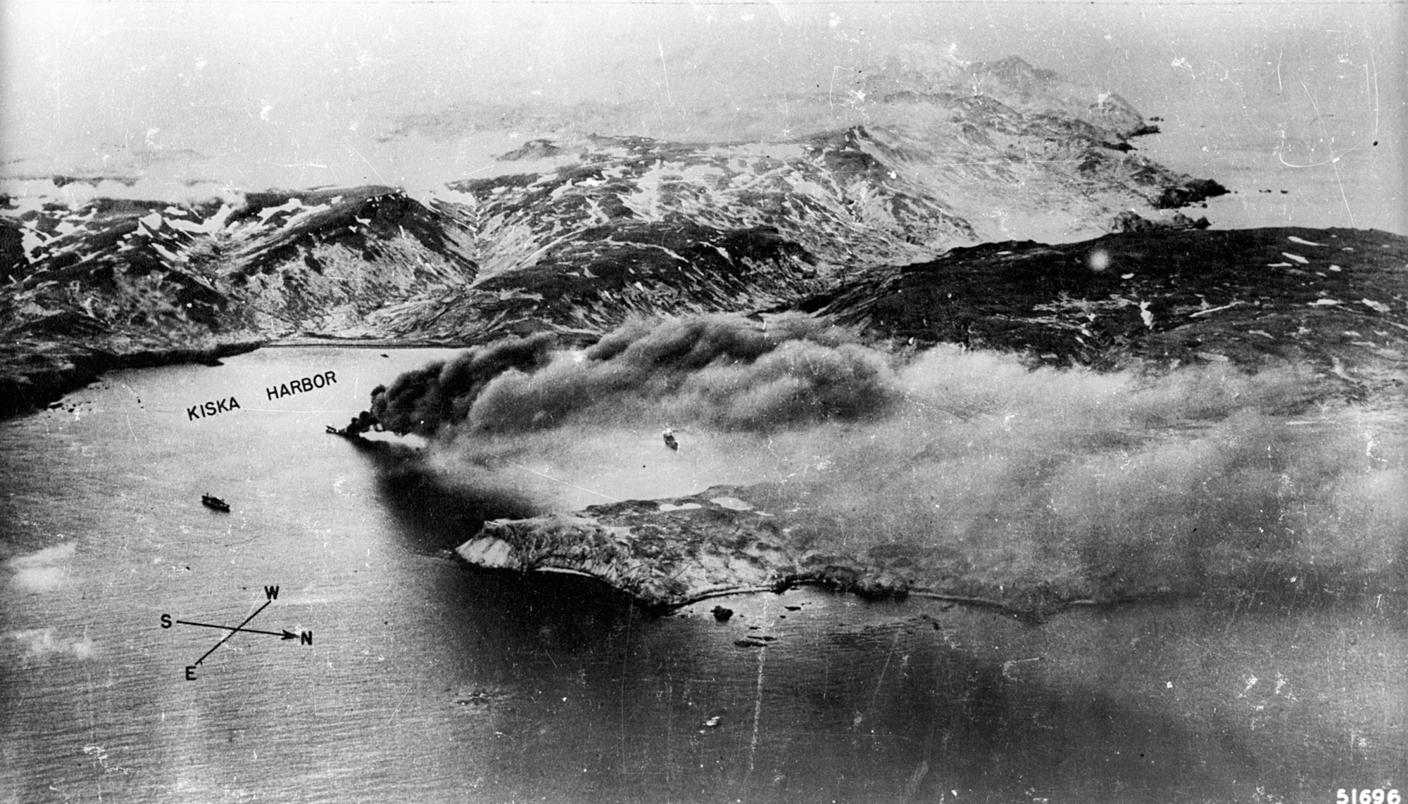 Japanese shipping is left burning in a Kiska harbor following a raid by 11th Air Force aircraft. (U.S. Air Force photo)