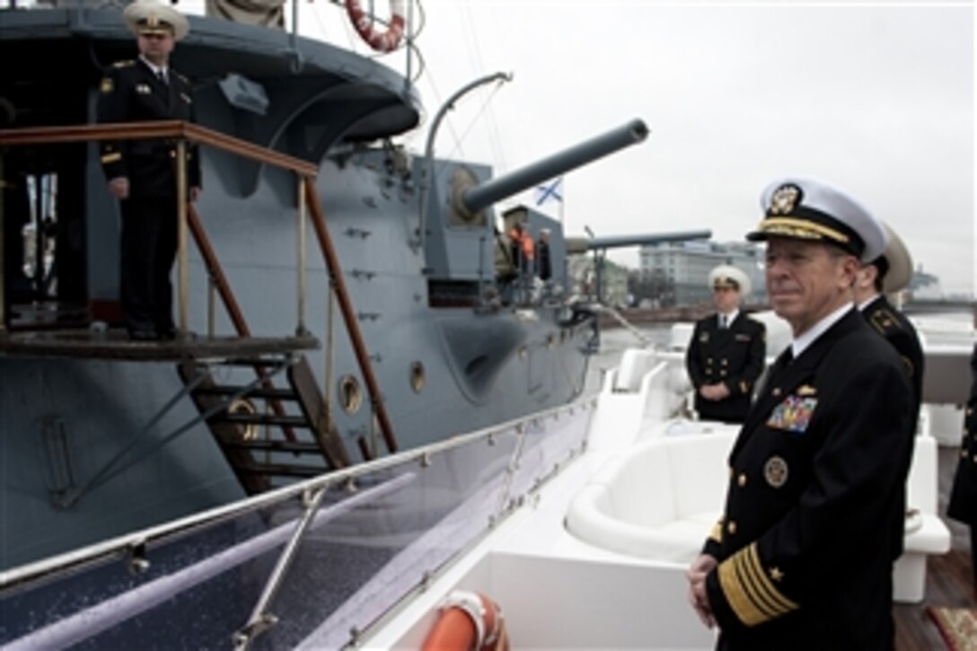 Chairman of the Joint Chiefs of Staff Adm. Mike Mullen, U.S. Navy, pulls away from the Russian World War I era cruiser Aurora in St. Petersburg, Russia, on May 7, 2011.  Mullen is on a three-day trip to the country to meet with his counterpart Chief of the General Staff of the Armed Forces of Russia Gen. Nikolai Makarov.  