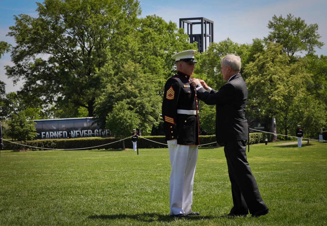 Two Afghan children pose for a picture as a joint-service combat logistics patrol rolls through their village, May 10, 2011.  Marines with Combat Logistics Battalion 8, 2nd Marine Logistics Group (Forward), the Route Clearance Platoon from Joint-Task Force Paladin, and soldiers with the 541st Transportation Company, 129th Combat Sustainment Support Battalion partnered to deliver mission-essential supplies to coalition forces operating near Forward Operating Base Shukvani, Afghanistan.  It is common for Afghan children to approach the convoy, and if possible interact with the troops.