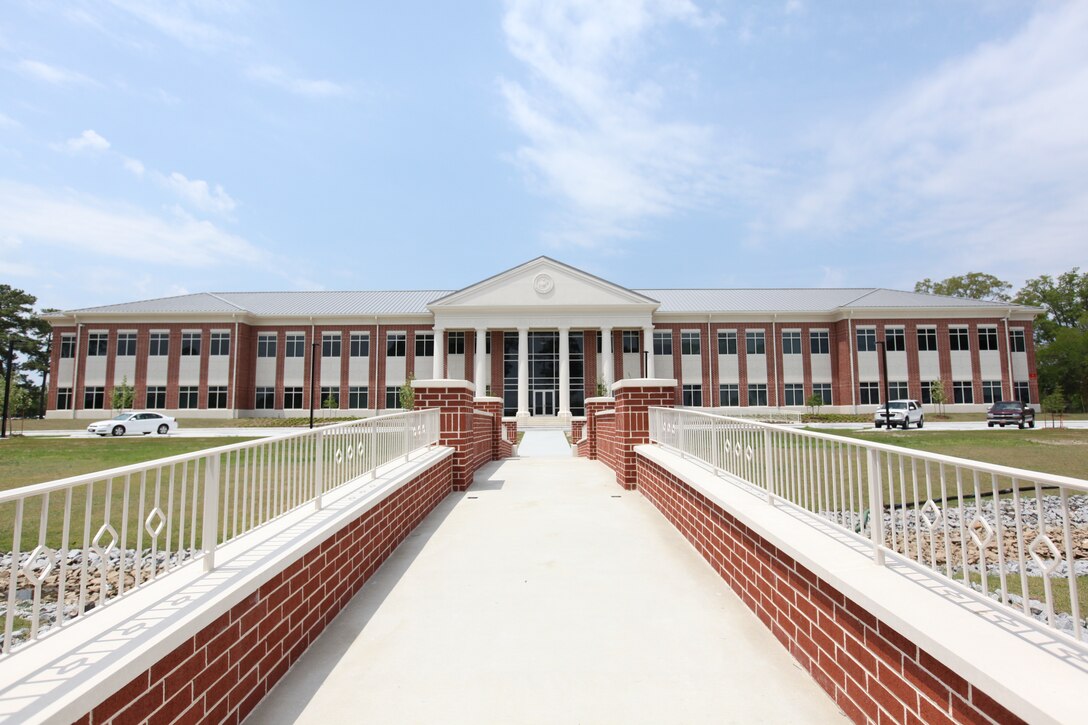 The new headquarters building is home to the 2nd Marine Aircraft Wing and Marine Corps Air Station Cherry Point command elements. This high tech facility uses multiple resources to help save energy and money such as ultraviolet protected windows, LED lighting in the parking lots and solar panels to power 2.5 percent of the building.
