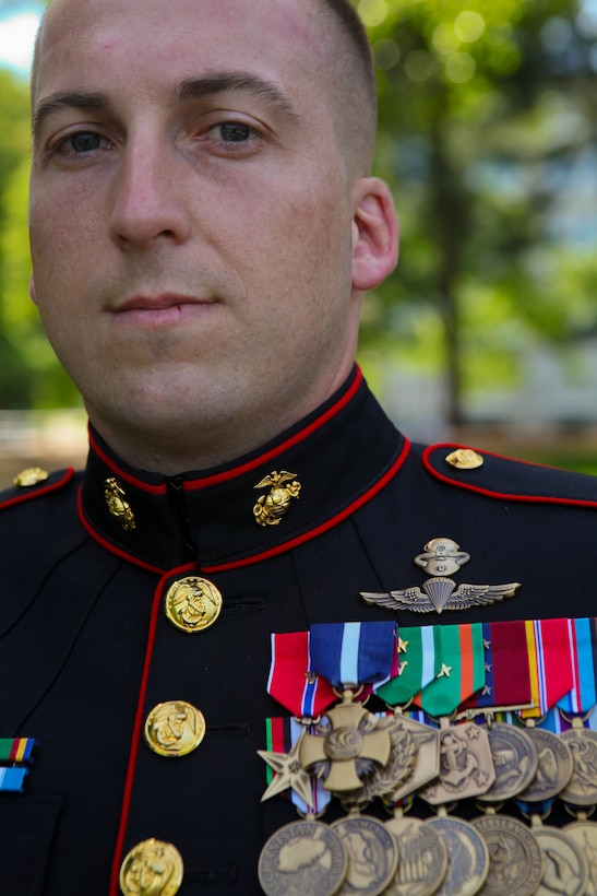 Gunnery Sgt. Brian M. Blonder was awarded the Navy Cross, the second highest award given for valor in the face of danger, during a ceremony at the Marine Corps War Memorial in Arlington, Va., May 10, 2011. He was recognized for his bravery and outstanding leadership during an all-day firefight against Taliban insurgents Aug. 8, 2008, during the battle of Shewan, Afghanistan. Although he and the Marines and sailors he was fighting alongside with were heavily outnumbered by the enemy, they managed to kill more than 50 insurgents and drove the rest out of their fortified fighting positions in the Taliban infested village in southern Farah province. Blonder, a reconnaissance Marine by trade, was serving as platoon sergeant with a force reconnaissance platoon attached to 2nd Battalion, 7th Marine Regiment. He was personally responsible for killing at least three Taliban combatants.