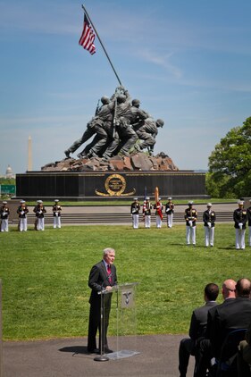 Secretary of the Navy Ray Mabus presents the Navy Cross to Gunnery Sgt. Brian M. Blonder during a ceremony at the Marine Corps War Memorial in Arlington, Va., May 10, 2011. Blonder received the second highest award given for valor in the face of danger for his actions during an all-day firefight against Taliban insurgents Aug. 8, 2008, during the battle of Shewan, Afghanistan. Although he and the Marines and sailors he was fighting alongside with were outnumbered against insurgents, they managed to kill more than 50 and drove the rest out of their fortified fighting positions in the Taliban infested village in southern Farah province. Blonder, a reconnaissance Marine by trade, was serving as platoon sergeant with a force reconnaissance platoon attached to 2nd Battalion, 7th Marine Regiment.