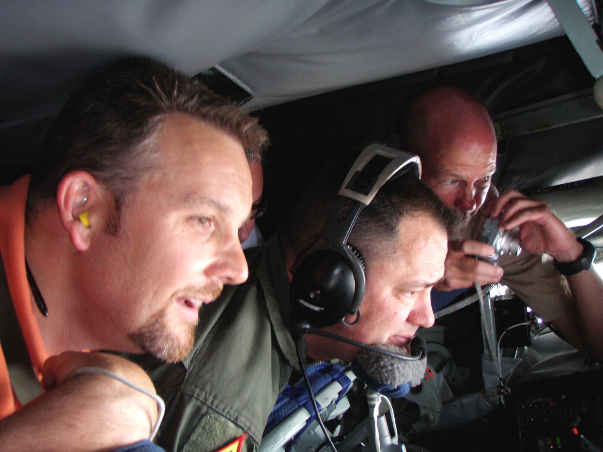 Las Vegas employers watch a KC-135 boom operator (center) refuel another aircraft in flight during a 926th Group Employer Appreciation Day. The 926th GP, in conjunction with the ESGR, held the event for employers of local reservists to thank them for their support. In addition to the orientation ride, the employers toured F-15, F-16, F-22 and A-10 aircraft and attended a recognition luncheon. (U.S. Air Force photo/Airman 1st Class Brett Clashman)
