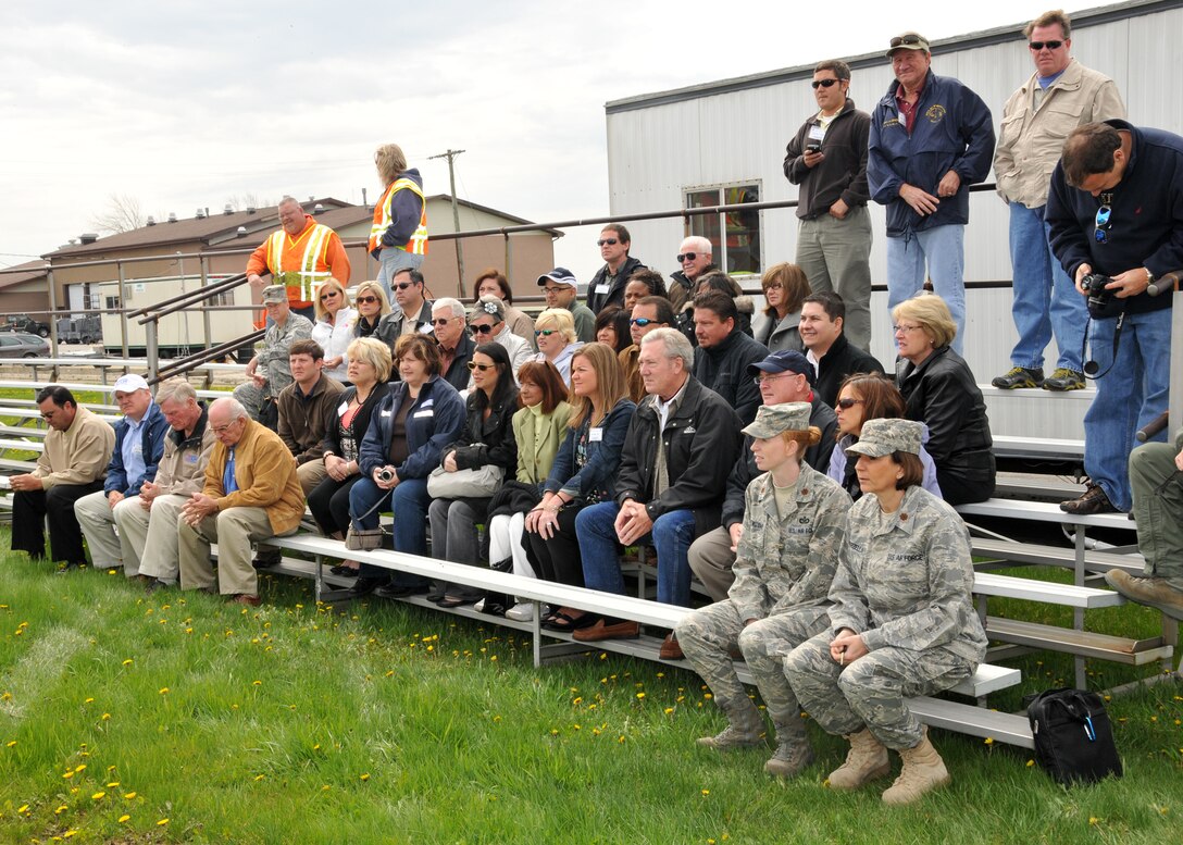 Several members of the 403rd Wing, Keesler Air Force Base, Miss. and over 40 Biloxi Miss. area civic leaders witness a controlled car crash, May 6, 2011,Niagara Falls Air Reserve Station, N.Y. The crash was set up for the 2011 Traffic Safety Fair held on base.  (U.S. Air Force photo by Staff Sgt. Joseph McKee)