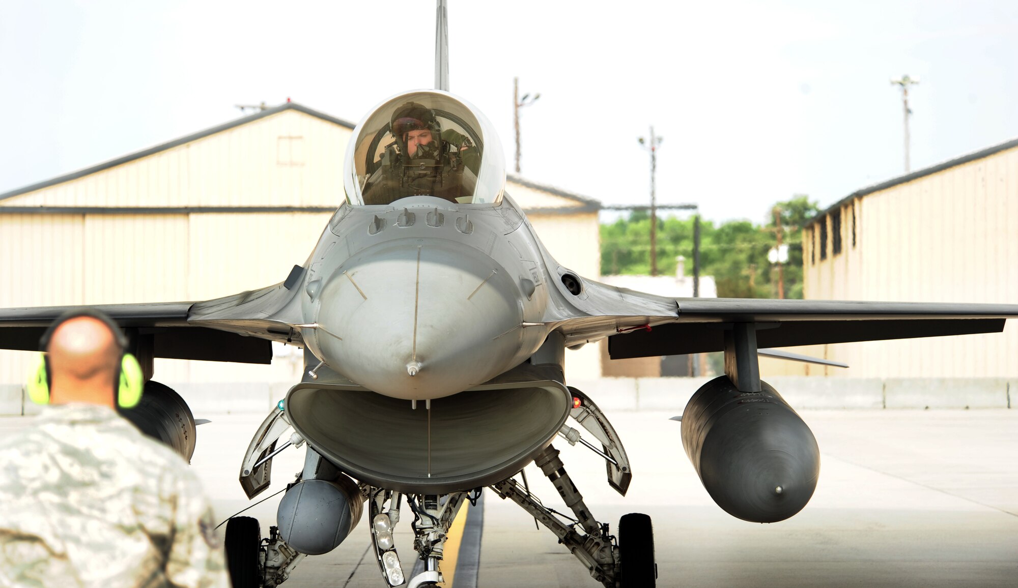 110506-F-6838W-047
SHAW AIR FORCE BASE, S.C. -- Captain Jared Burris, 77th Fighter Squadron assistant chief of training, and Staff Sgt. Timothy Lewing, 20th Fighter Wing alert facility, prepare an F-16 for the last alert flight here May 6, 2011. Shaw's 20th Fighter Wing Alert facility has guarded our East Coast since Sept. 11, 2001 through Nov.15, 2003 and Aug. 1, 2006 through May 9, 2011 (U.S. Air Force photo/Airman 1st Class Neil D. Warner) (Released)
