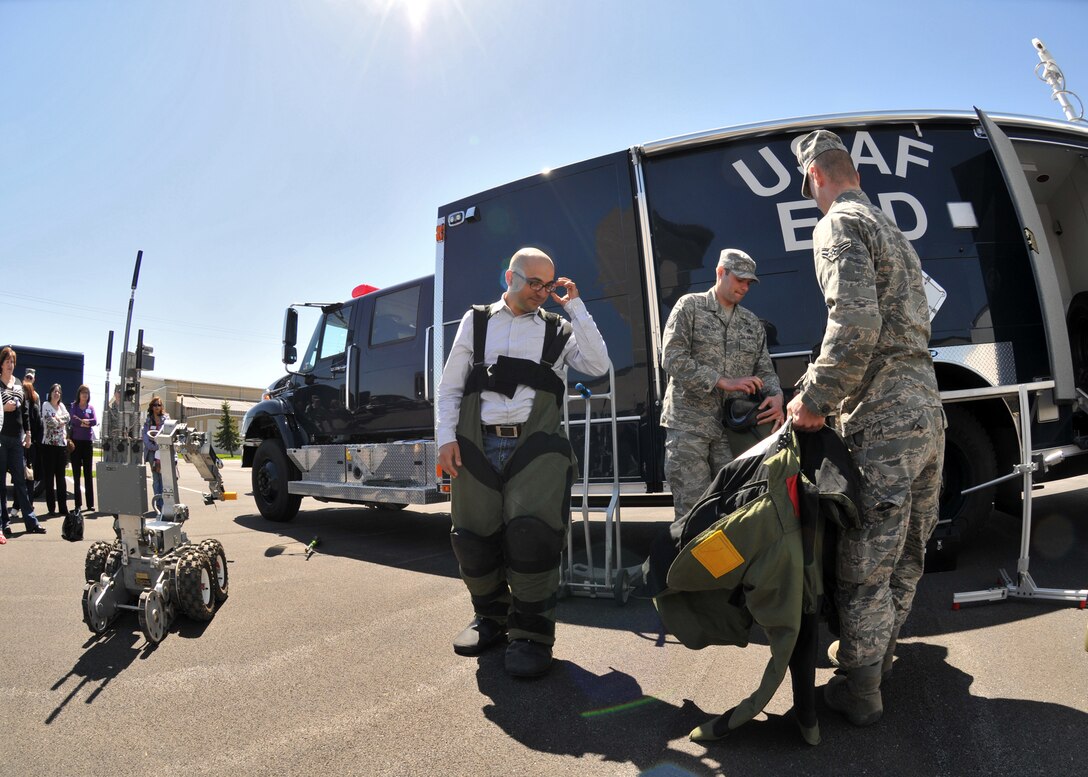 Several members of the 403rd Wing, Keesler Air Force Base, Miss. and over 40 Biloxi Miss. area civic leaders are given a presentation by 914th Explosive Ordinance Disposal Flight Chief Tech. Sgt. Keith Hartloff, May 5, 2011 Niagara Falls Air Reserve Station, N.Y.. Sergeant Hartloff’s demonstration included an EOD robot and examples of what EOD members might face in the field.  (U.S. Air Force photo by Staff Sgt. Joseph McKee)