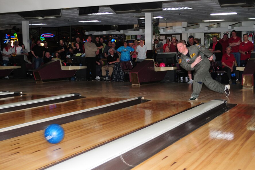 Wing Vice Commander Lt. Col. Jon Safstrom of the 148th Fighter Wing, Duluth, Minn. rolls the first ball of the day to start off the Air National Guard Bowling Tournament held at Country Lanes in Duluth, Minn. on May 6, 2011.  Retired and current members of the ANG from across the country took part in the bowling tournament.  (U.S. Air Force photo by Staff Sgt. Donald Acton/released)