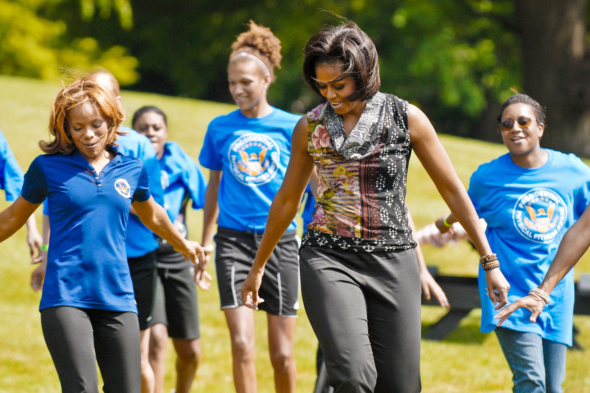 First Lady Michelle Obama shows off her dance moves during a fitness and nutrition event May 9, 2011, at the White House. The first lady and a group of about 80 National Guard and Reserve teens tried out several fitness and nutrition stations scattered across the South Lawn.  (DOD photo/Elaine Sanchez)