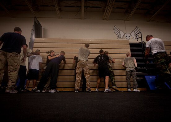 MOODY AIR FORCE BASE, Ga. -- Airmen from Moody Air Force Base, Ga., practice techniques used for Krav Maga training April 5. Airmen had to fight out of a rear-choke hold and use force to stop their attacker. (U.S. Air Force photo/Airman 1st Class Joshua Green)