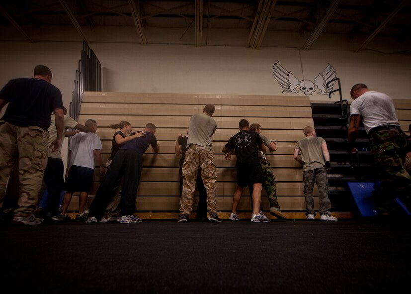 MOODY AIR FORCE BASE, Ga.-- Airmen from Moody  practice techniques used for Krav Maga training April 5. Airmen had to fight out of a rear-choke hold and use force to stop their attacker. (U.S. Air Force photo/Airman 1st Class Joshua Green)(RELEASED)
