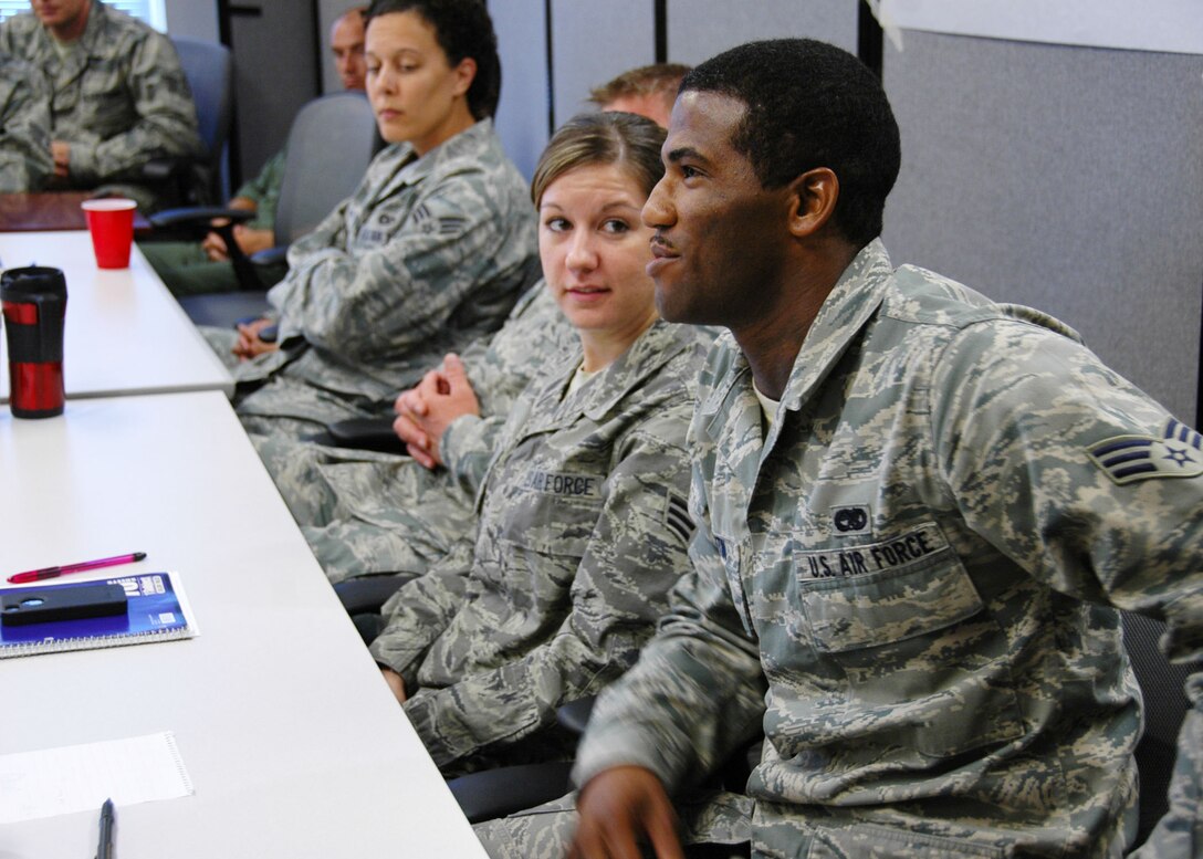 Senior Airman Aaron Celestin, a 919th Maintenance Squadron integrated avionics systems apprentice, asks a question during the briefing at Duke Field’s NCO Leadership Development Course May 6 by Chief Master Sgt. Dwight Badgett, the command chief for Air Force Reserve Command.  Chief Badgett, the command’s top advocate for more than 60,000 Reserve and active-duty AFRC enlisted members, visited the 919th Special Operations Wing  May 5-6 to thank its enlisted Airmen for their service, respond to their feedback and brief them on force development and other career enhancement programs and topics.  (U.S. Air Force photo/Dan Neely)
