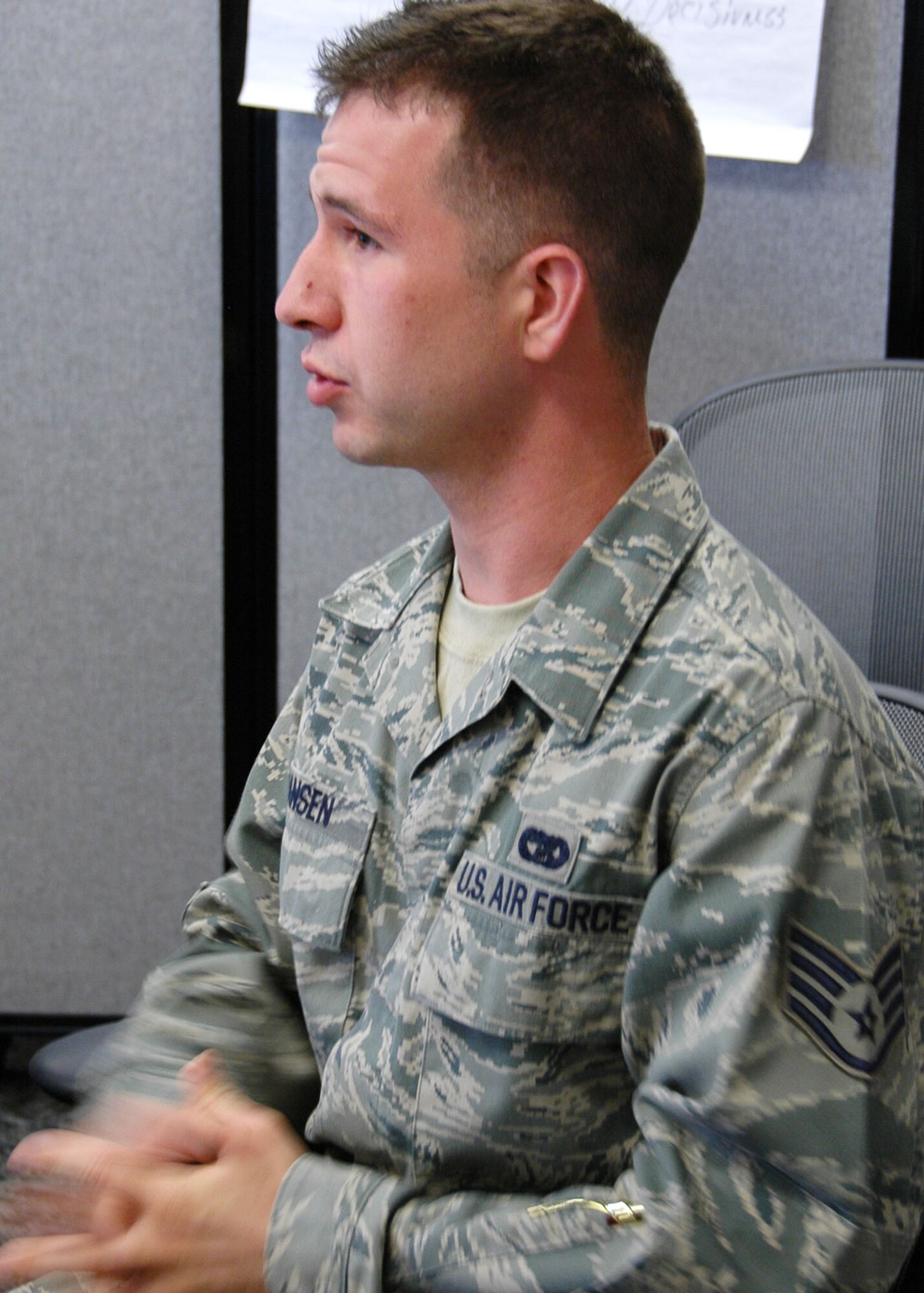 Staff Sgt. Steven Hansen, a 919th Logistics Readiness Squadron air transportation journeyman, asks a question during the briefing at Duke Field’s NCO Leadership Development Course May 6 by Chief Master Sgt. Dwight Badgett, the command chief for Air Force Reserve Command.  Chief Badgett, the command’s top advocate for more than 60,000 Reserve and active-duty AFRC enlisted members, visited the 919th Special Operations Wing  May 5-6 to thank its enlisted Airmen for their service, respond to their feedback and brief them on force development and other career enhancement programs and topics.  (U.S. Air Force photo/Dan Neely)