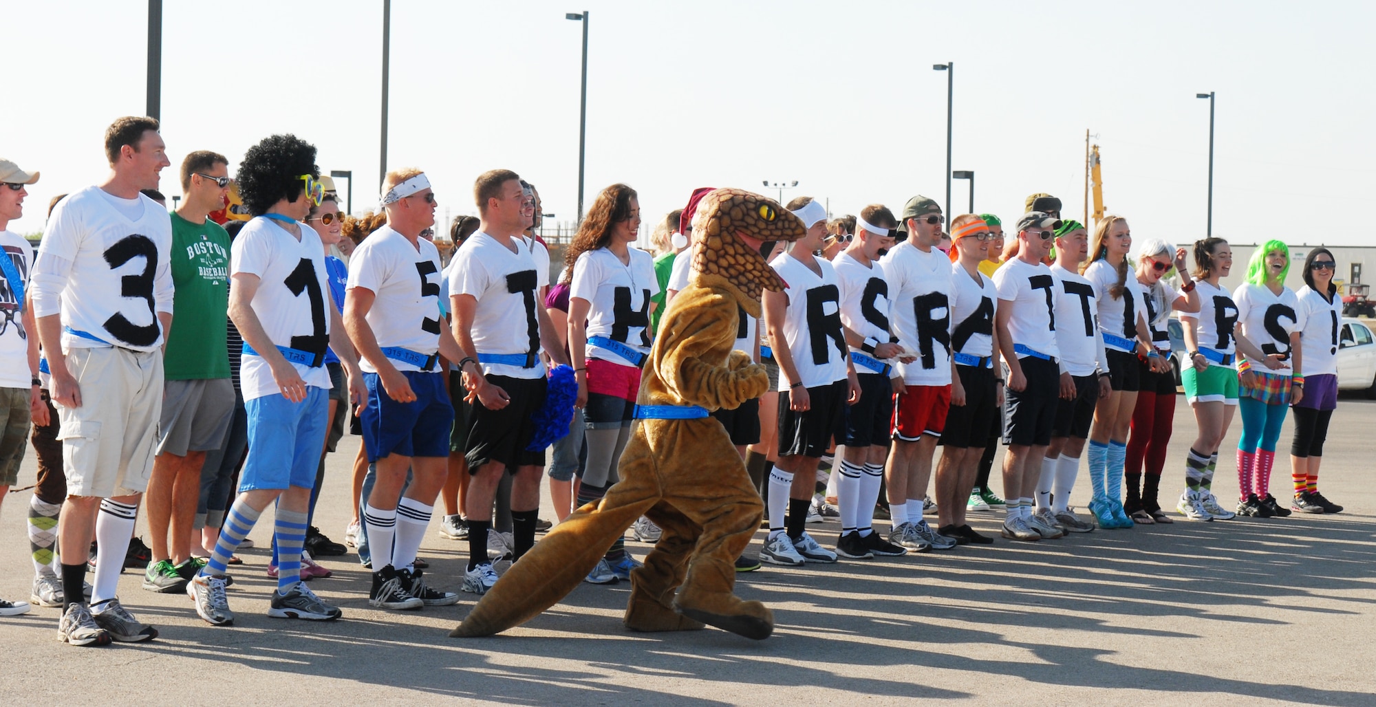 GOODFELLOW AIR FORCE BASE, Texas -- Students of the 315th Training Squadron get into formation to show they have spirit at the drill competition, May 7, 2011. The 315TRS won the squadron spirit portion of the drill competition.(U.S. Air Force photo/Airman 1st Class Michael Smith)
