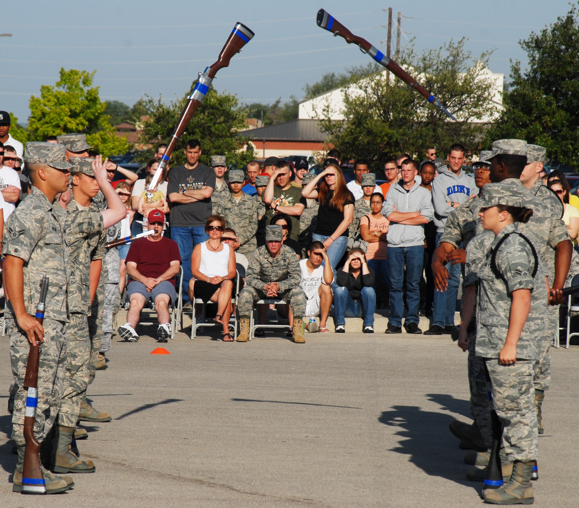 GOODFELLOW AIR FORCE BASE, Texas -- The 316th Training Squadron drill team tosses riffles to fellow team members at the drill competition, May 7, 2011. The 316 TRS won the exhibition portion of the drill competition.(U.S. Air Force photo/Airman 1st Class Michael Smith)

