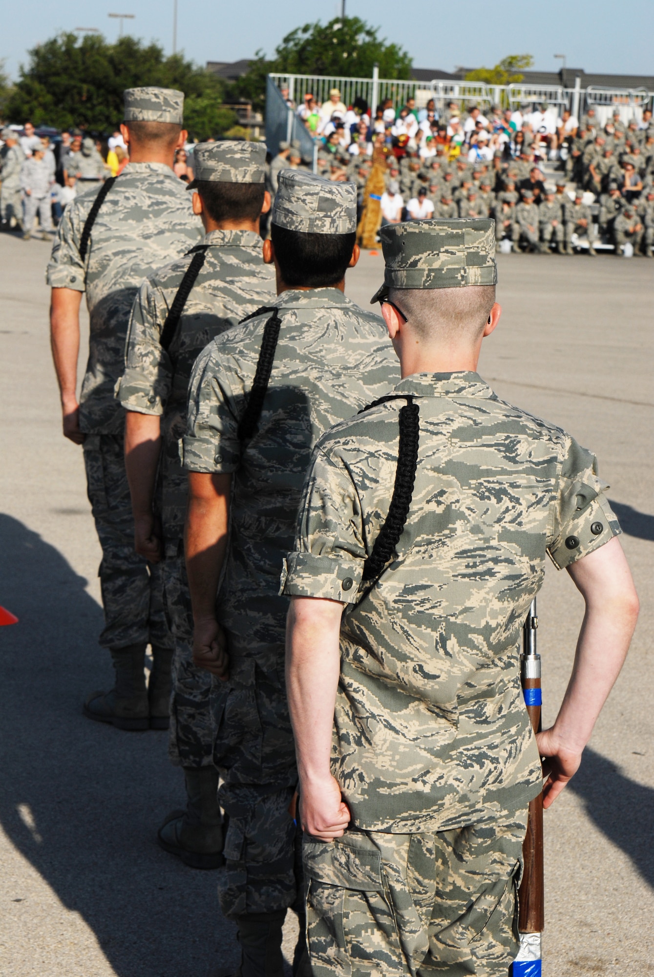 GOODFELLOW AIR FORCE BASE, Texas -- Members of the 316th Training Squadron prepare to start their exhibiton routine at the drill competition, May 7, 2011. The 316 TRS won the exhibiton portion of the drill competition.(U.S. Air Force photo/Airman 1st Class Michael Smith)
