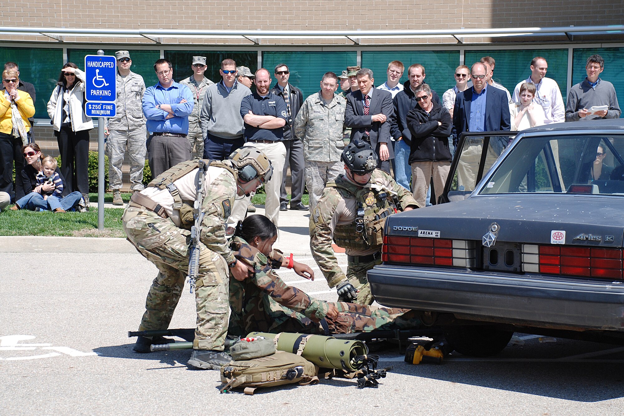 Pararescue jumpers (PJs) from the 123 Special Tactics Squadron Air National Guard Unit, Louisville, Ky. staged a rescue demonstration for researchers at the 711th Human Performance Wing, Human Effectiveness Directorate (711 HPW/RH) at Wright-Patterson Air Force Base, Ohio. The 711 HPW/RH is transitioning to the Specialized Warfighter Operations Research and Development (SWORD) program, and were learning about PJs in order to provide technology to help them perform their work more efficiently. (U.S. Air Force photo by Chris Gulliford)
