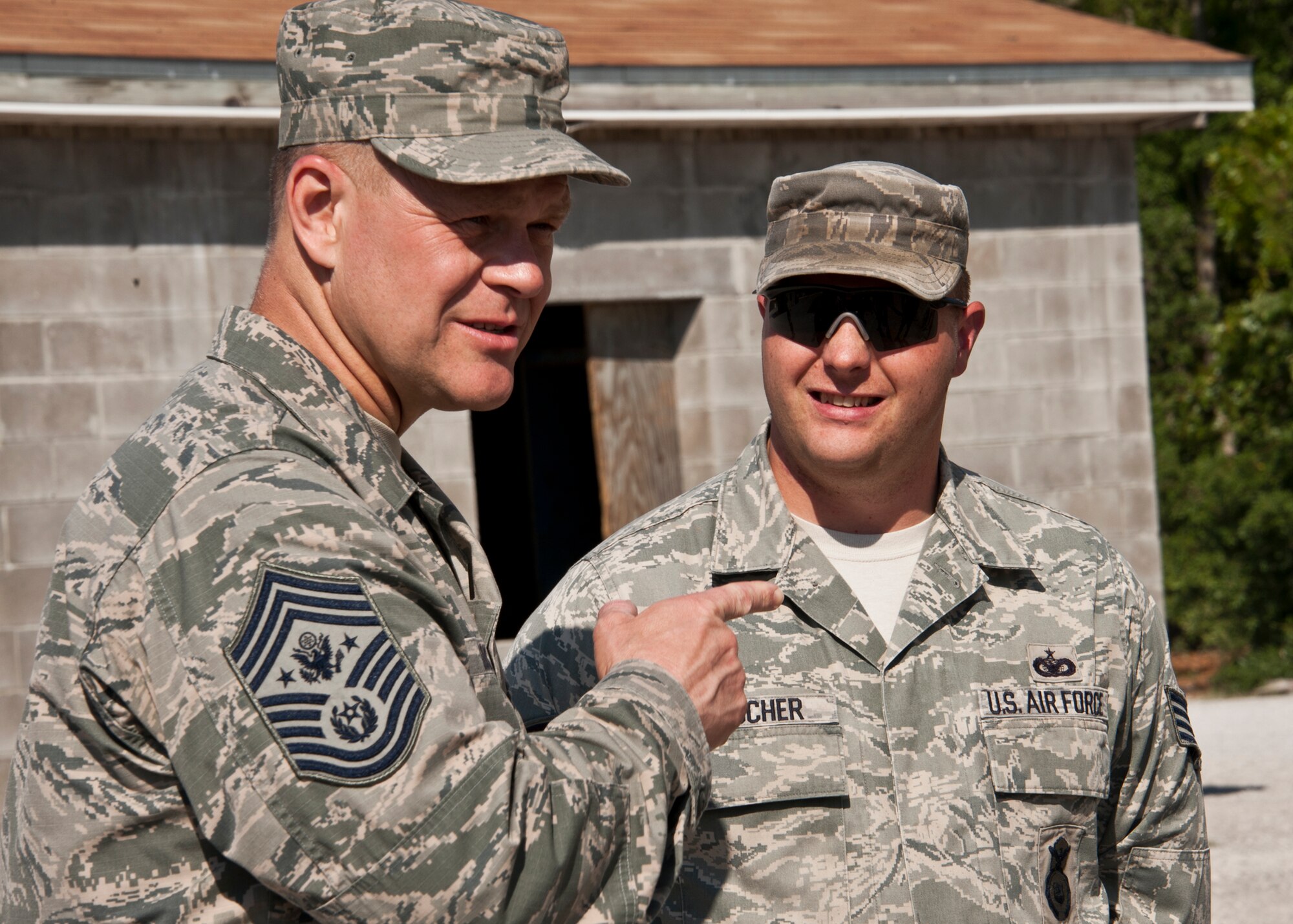Chief Master Sgt. of the Air Force James A. Roy speaks to Staff Sgt. Ivan Morscher and other 96th Ground Combat Training Squadron Airmen during his tour of their training area at Eglin Air Force Base, Fla., May 6.  The chief received a hands-on “Brave Defender” experience with the 96th GCTS, firing weapons, watching demonstrations and driving a humvee through a village with simulated improvised explosive devices.  (U.S. Air Force photo/Samuel King Jr.)