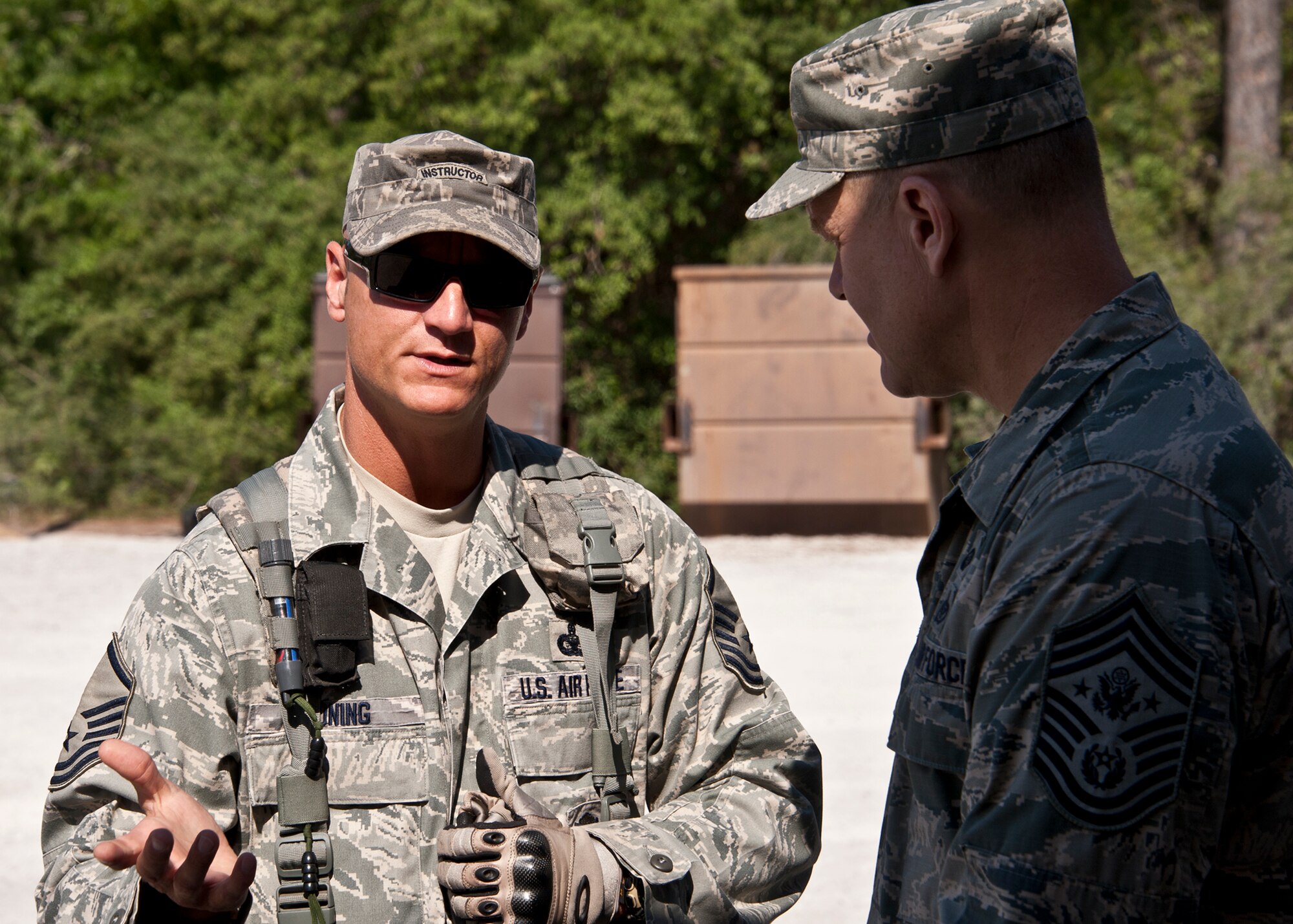 EGLIN AIR FORCE BASE, Fla. -- Master Sgt. Todd Coning, 96th Ground Combat Training Squadron, briefs Chief Master Sgt. of the Air Force James A. Roy on the squadron’s mission and particular scenarios taught by its instructors at Eglin Air Force Base, Fla., May 6.  The chief received a hands-on “Brave Defender” experience with the 96th GCTS, firing weapons, watching demonstrations and driving a humvee through a village with simulated improvised explosive devices.  (U.S. Air Force photo/Samuel King Jr.)