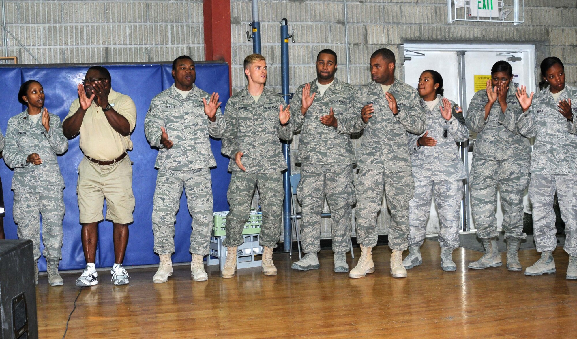 Members from the 379th Chior team perform at the Prayer Breakfast 10 May in Southwest Asia.  The chior performed for the many in attendance. (U.S. Air Force photo/ Staff Sgt. Anthony Graham)